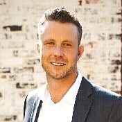 A person smiling for the camera
Description automatically generated with medium confidence