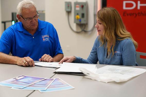 people reviewing paperwork