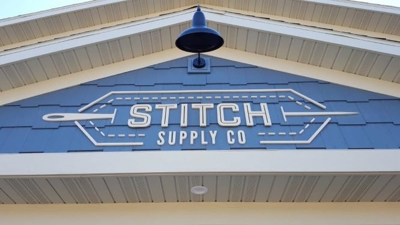 Outdoor Signage for Stitch Supply Co.  Photo