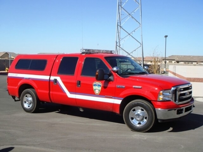 Red pickup with custom vehicle graphics Photo