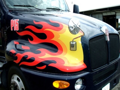 Black car with custom fire graphics Photo