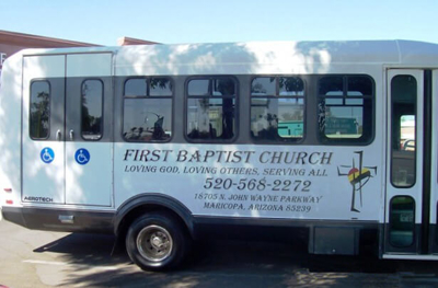 First Baptist Church white van with custom graphics Photo
