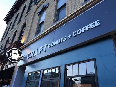 Customized donuts and coffee shop signage Photo
