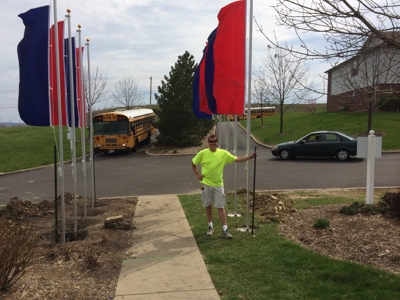 Man holding a flag pole Photo
