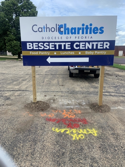 Wayfinding sign for Catholic Charities Photo