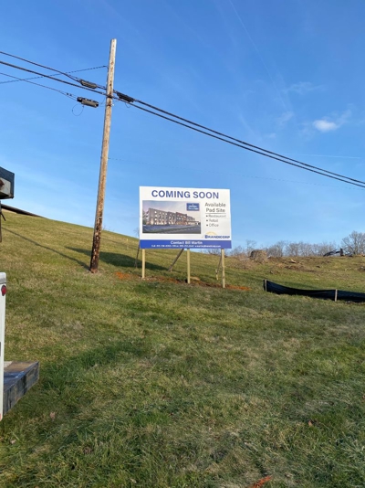 Commercial construction business large site sign. Photo