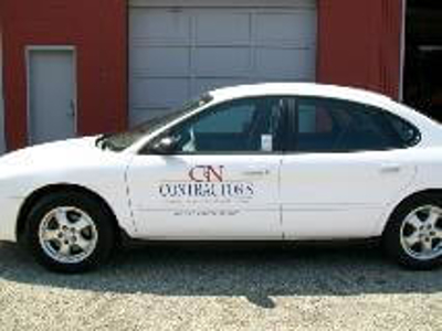 White car with vehicle graphics Photo