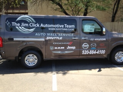 Gray van with custom graphics Photo