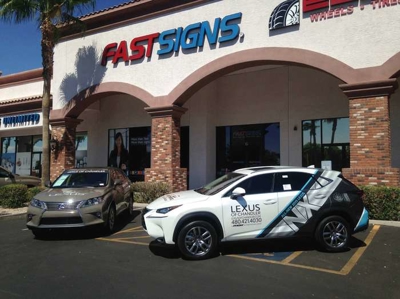 White car with custom car wrap Photo