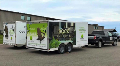 Moving truck with custom vehicle wrap Photo