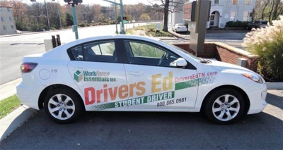 White car with custom vehicle graphics Photo