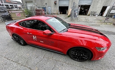 Red mustang with custom car wrap Photo