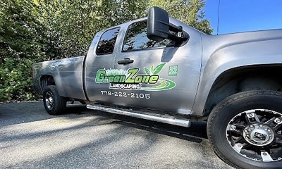 Gray pickup with Green Zone graphics Photo