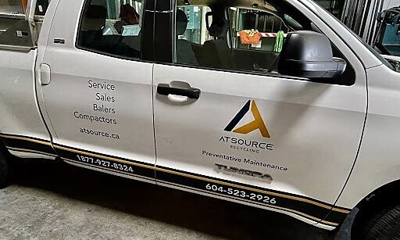White pickup with custom vehicle graphics Photo