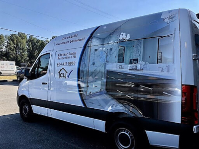 White van with custom vehicle wrap Photo