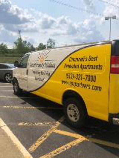 Van with custom vehicle wrap Photo