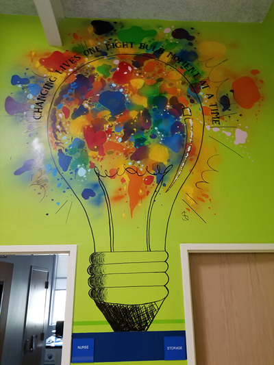 colorful bulb graphics on the wall Photo