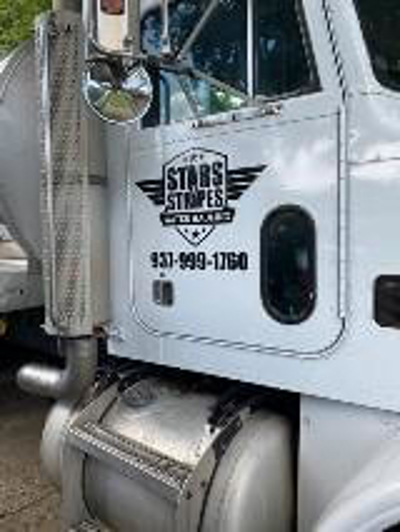Star strips water hauling logo on the truck  Photo