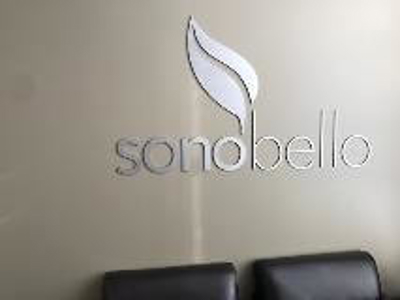 Sonobello logo on the wall Photo