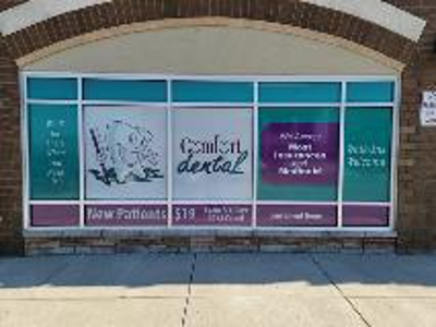 Comfort dental banner on the window Photo
