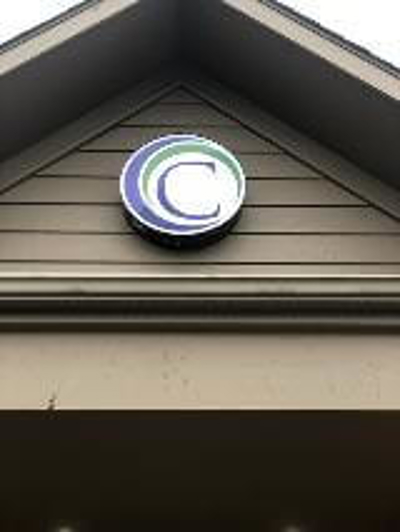 Letter C logo under the roof of the house  Photo