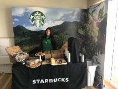 Starbucks banner and products Photo