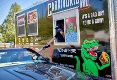 Carnivorium truck with an employee Photo