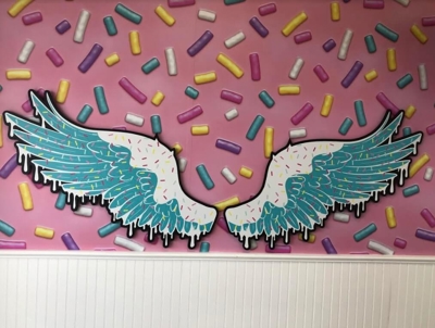 Wings on the colorful wall Photo