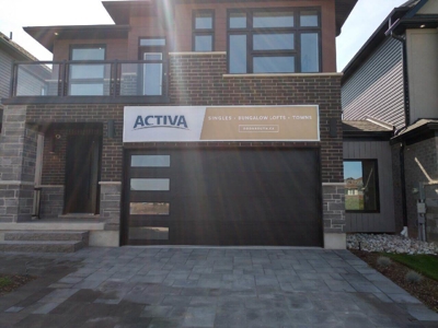 Activa signage on the building Photo