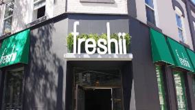 Freshii grass sign Photo
