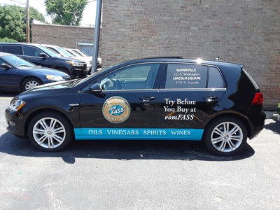 Vom Vass vehicle wrapped with graphics Photo