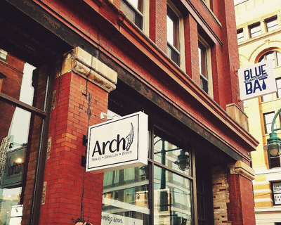 Arch signage on the building Photo
