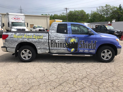 Vehicle wrapped with graphics Photo