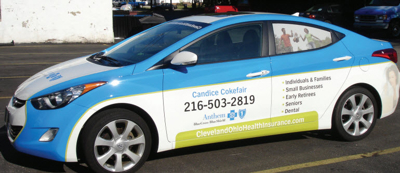 Car wrapped with graphics Photo