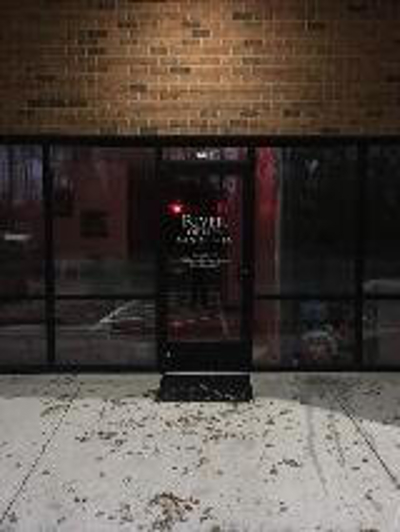 River of life ministries logo on the door Photo