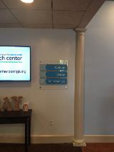 Directory sign on the wall Photo