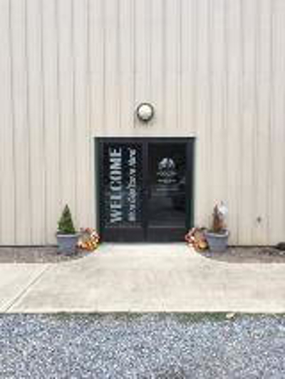Custom sign on the door Photo