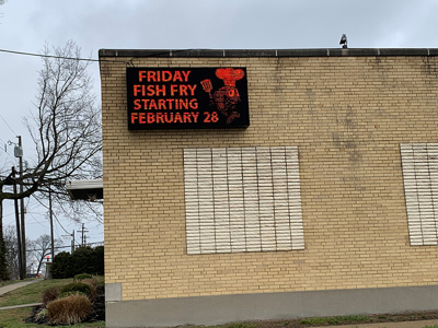 Black and red theme signage in the wall Photo