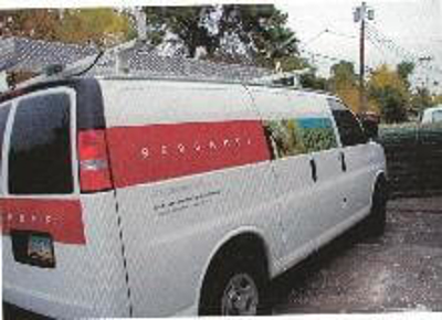 White van wrap with graphics Photo