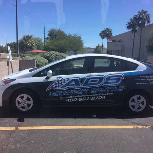 White car on a parking lot