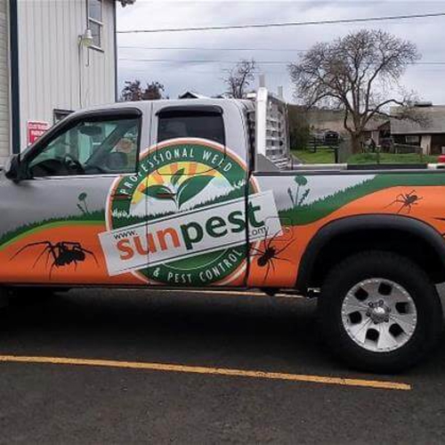 Sunpest pickup with custom vehicle graphics