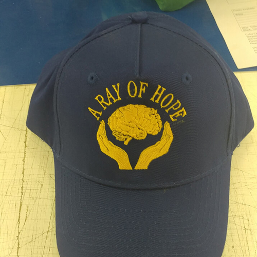 A Ray of Hope custom embroidery on gray cap