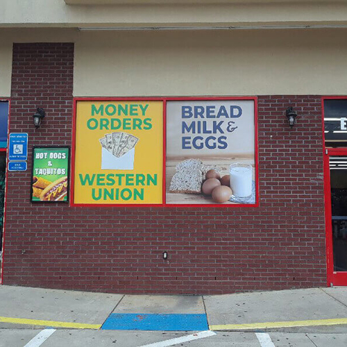 Images on the brick wall outside the store