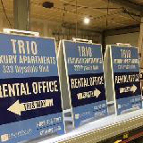 Trio luxury apartment sandwich frame sign 