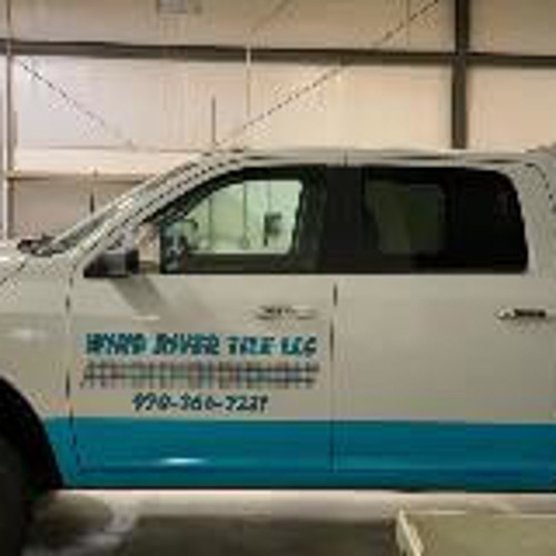 Vehicle with letters design parked on the garage
