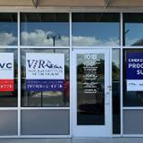 Glass door with posters and banners