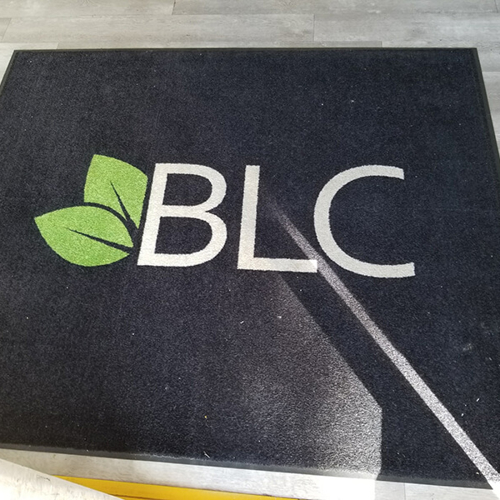 Green and whote lettering in the black decal