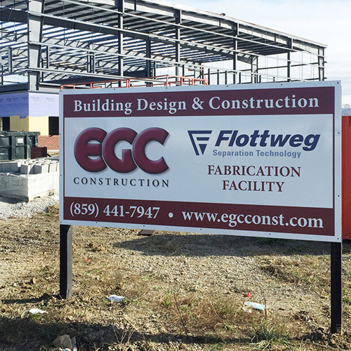 Red and white sign on poly metal