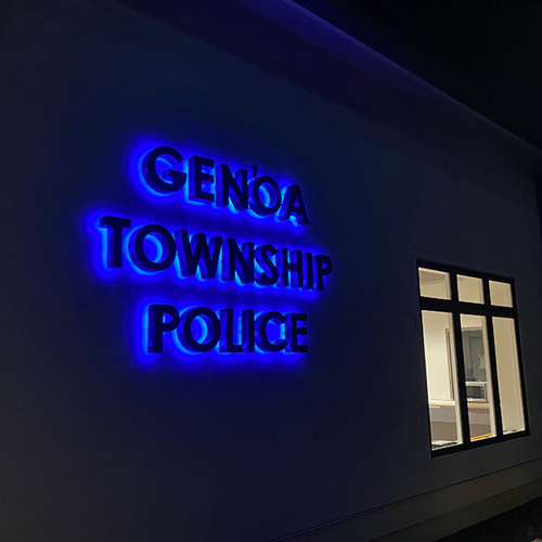 Blue Luminis signage of genoa township police