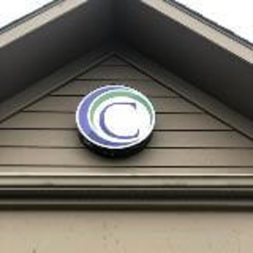 Letter C logo under the roof of the house 